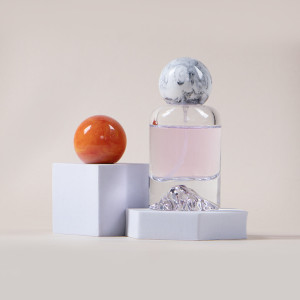 Wholesale 100ml Unique Round Luxury Fairy Glass Perfume Spray Bottles with Crimp Neck