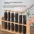 2023 New High Borosilicate Round Bottom Glass Tube for Coffee Beans Spice Display with Airtight Bamboo Lid and Wood Holder