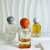 Low Moq Clear Square Round Shape Spray Glass Perfume Bottle 50ml Volcano Base Perfume Glass Bottles with Resin Ball Cap